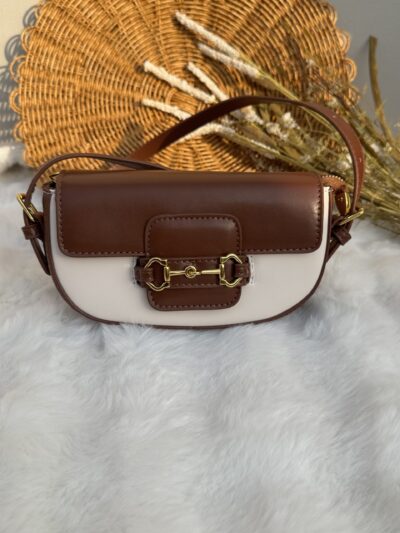 Saddle crossbody