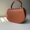 Mustard brown triplet bag