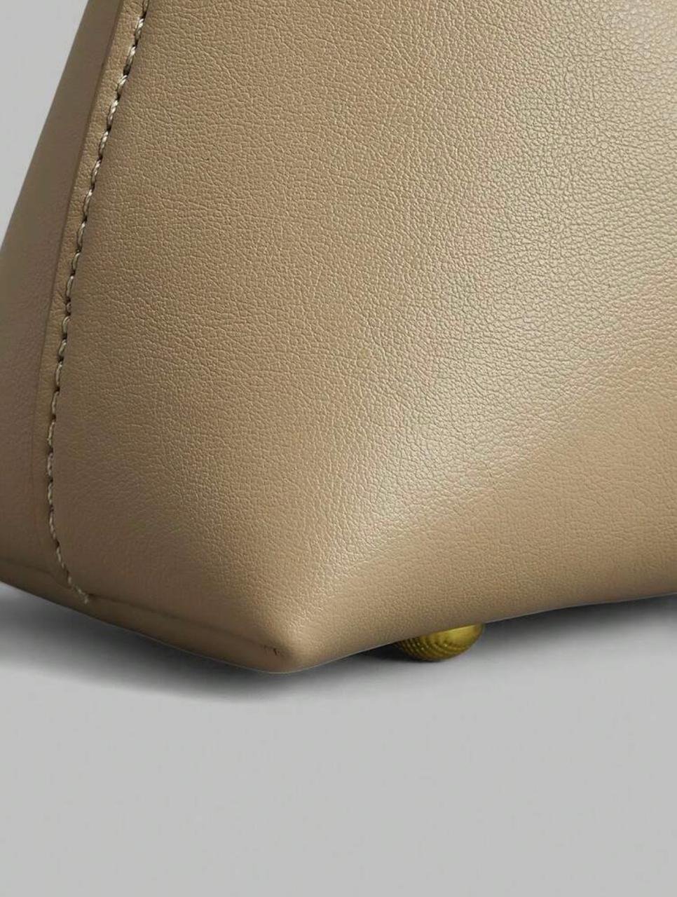 Minimalist Asymmetrical apricot color Bag - Image 4