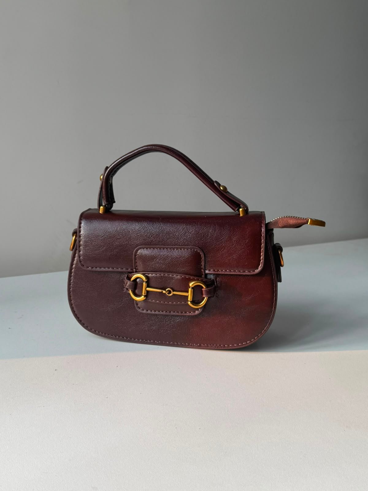 shiny brown crossbody bag
